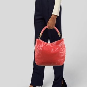 Yves Saint Laurent Roady handbag in orange/red leather